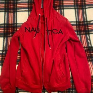 Red Nautica zip up hoodie with a dark blue and white striped hood